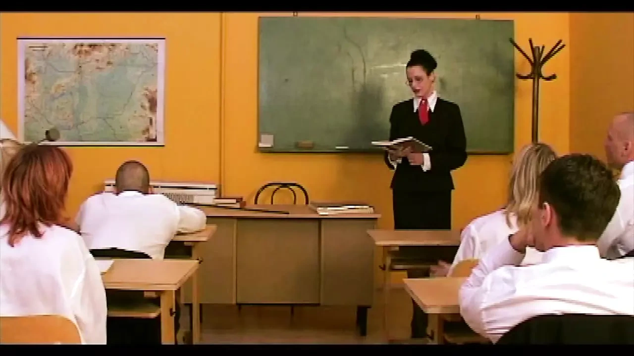 The Teacher Doggy Over the Desk Takes a Nice Cock Actually 2