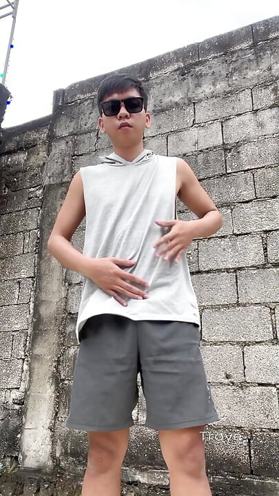 Cute Asian takes a morning walk at the park and masturbates