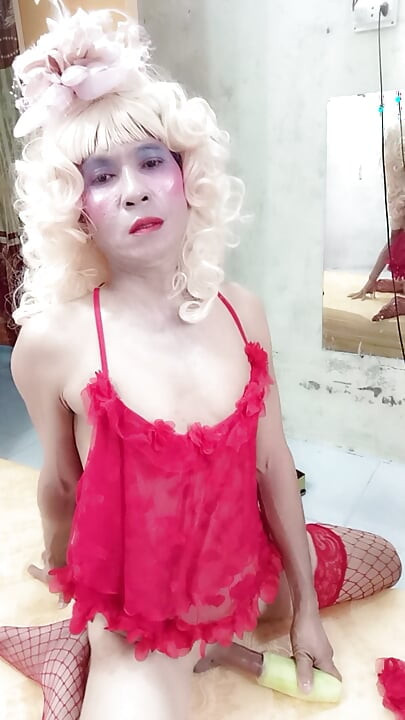 Oanh Le transgender wearing suggestive clothes to play with cans pretending to be too happy