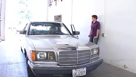 Big boobed redhead babe fucks her car worker