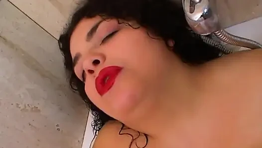 Brunette masturbates in the bathroom