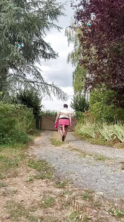 Dressed in a pink plaid mini skirt for a night out