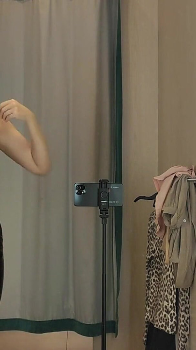 Key moment from "Try on haul transparent and latex clothes in the dressing room. Public fetish"