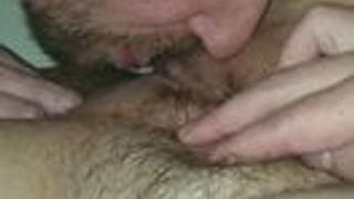 Spread wet pussy lips to lick her throbbing clit