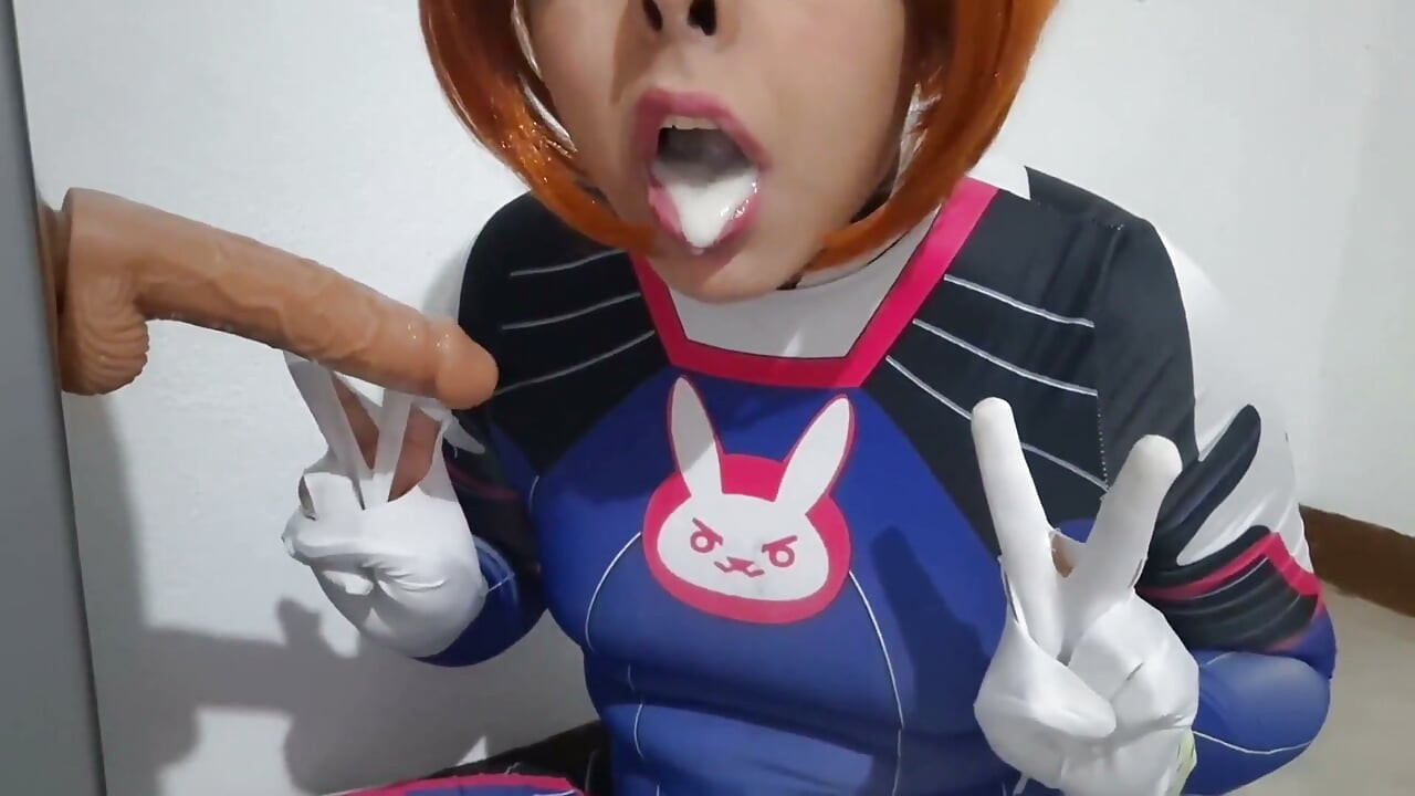 Full Version: Femboy with Dva Cosplay and BDSM Nosehook Giving a Blowjob, Eating Cum and Deepthroat to Big Dildo