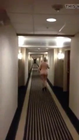 Walking naked in the hotel hallway