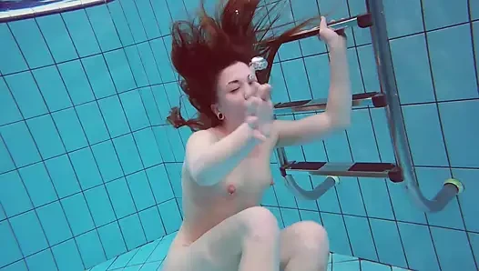 Pretty Polish teen Alice swimming without clothes on