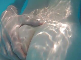 Swimming around naked in a garden pool with teasing