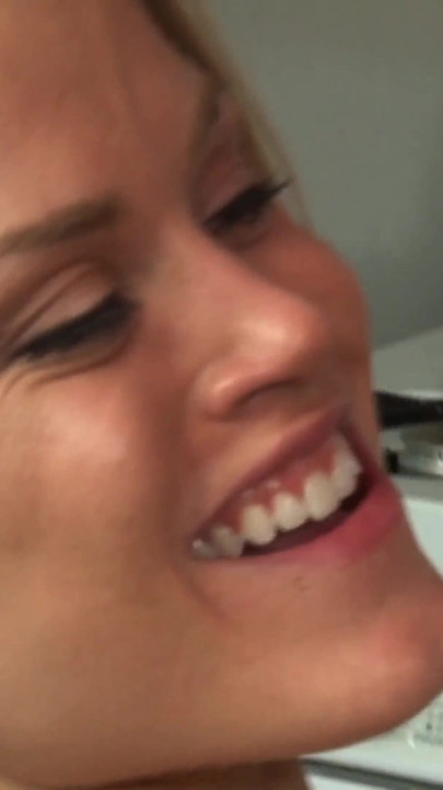 Hot blonde seduces her girlfriend in the kitchen