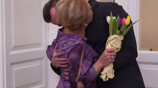 Old granny gets warm visit from young boy