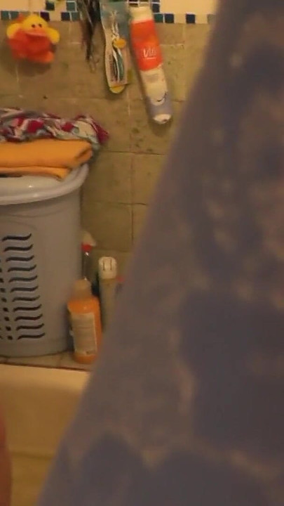 Must-see moment from "Stepmom goes to bathroom, wanks pussy, student stepson watches"