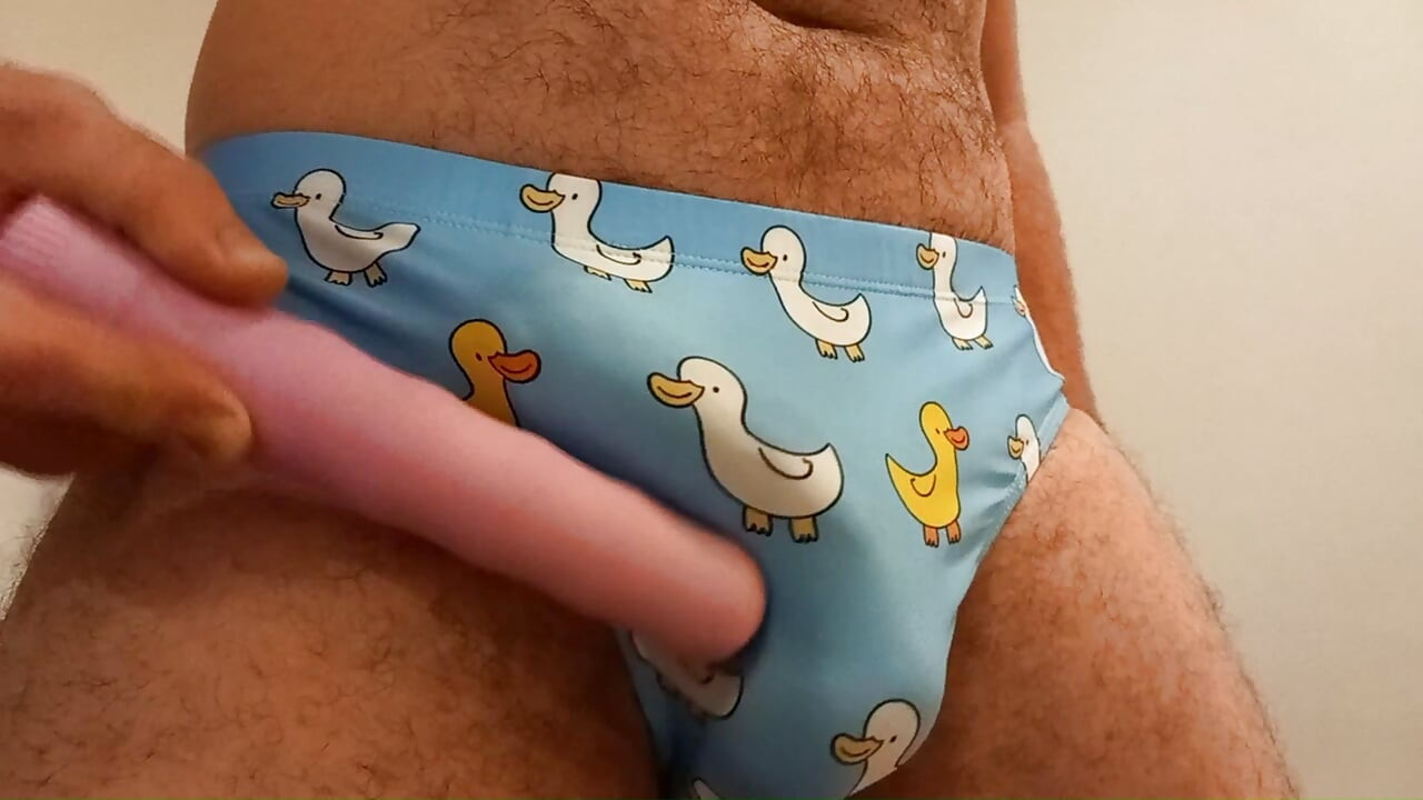 Speedo cum. Rubbing, vibrating, masturbating small penis bulge in speedo, swim trunks, brief. Please humiliate in the comments.