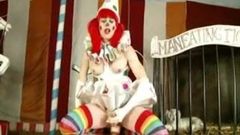 Shemale Clown Takes Huge Dildo at the Circus