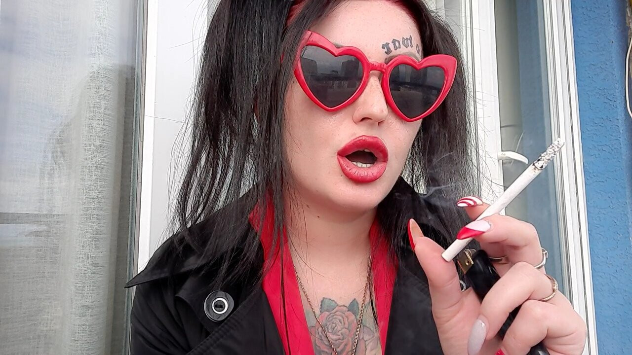 Sexy smoking fetish from Dominatrix Nika. Mistress smokes 2 cigarettes and blows smoke in your face. Sexy red lips