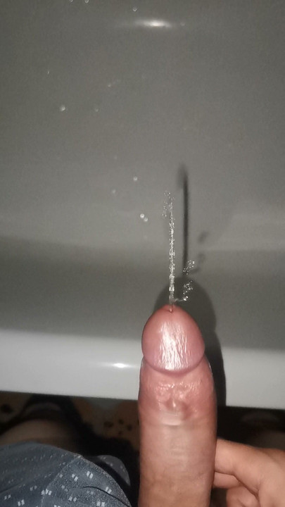 A powerful stream from a hard cock