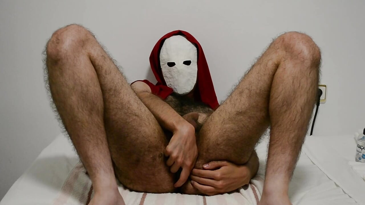 Masked guy uses his prostate massager