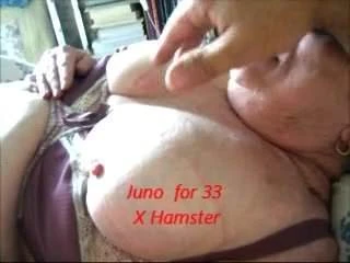 Playing with granny's big tits