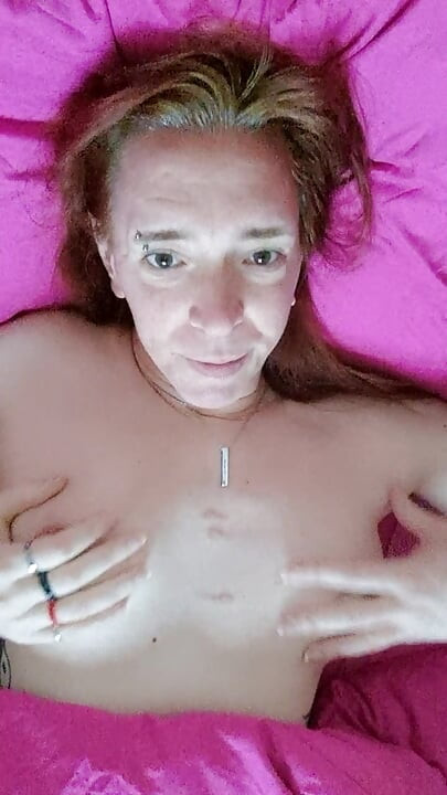 Trans playing in bed solo