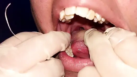 Trying to Use Dental Floss (close-up)
