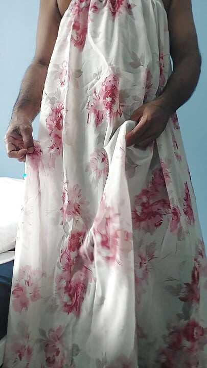 I'm masterbating in a flowery flowing silky seethrough fleard skirt and cum