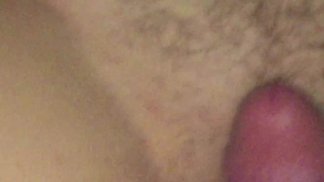 Spraying her with cum