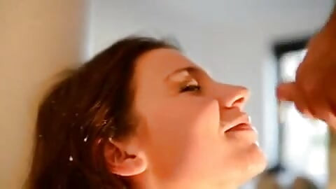 Julie Skyhigh tied to a pole sucks like a whore and takes a big squirt of cum on her angel face