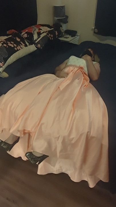 Enjoying a cuteute pink satin prom dress in bed | Clip 1