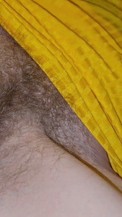 I'm playing with her hairy cunt. In the middle of her cunt is a vibrator. | Clip 1