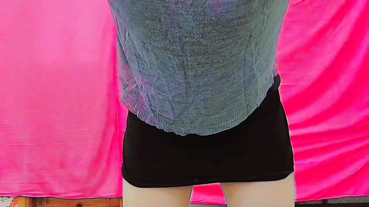 Soft feminine femboy stretching legs in yoga outfit