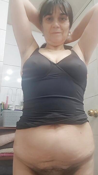 showing off her breasts and a little more of mom's