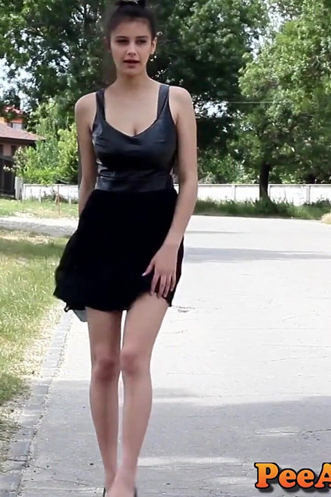Sexy pee in high heels and a short dress