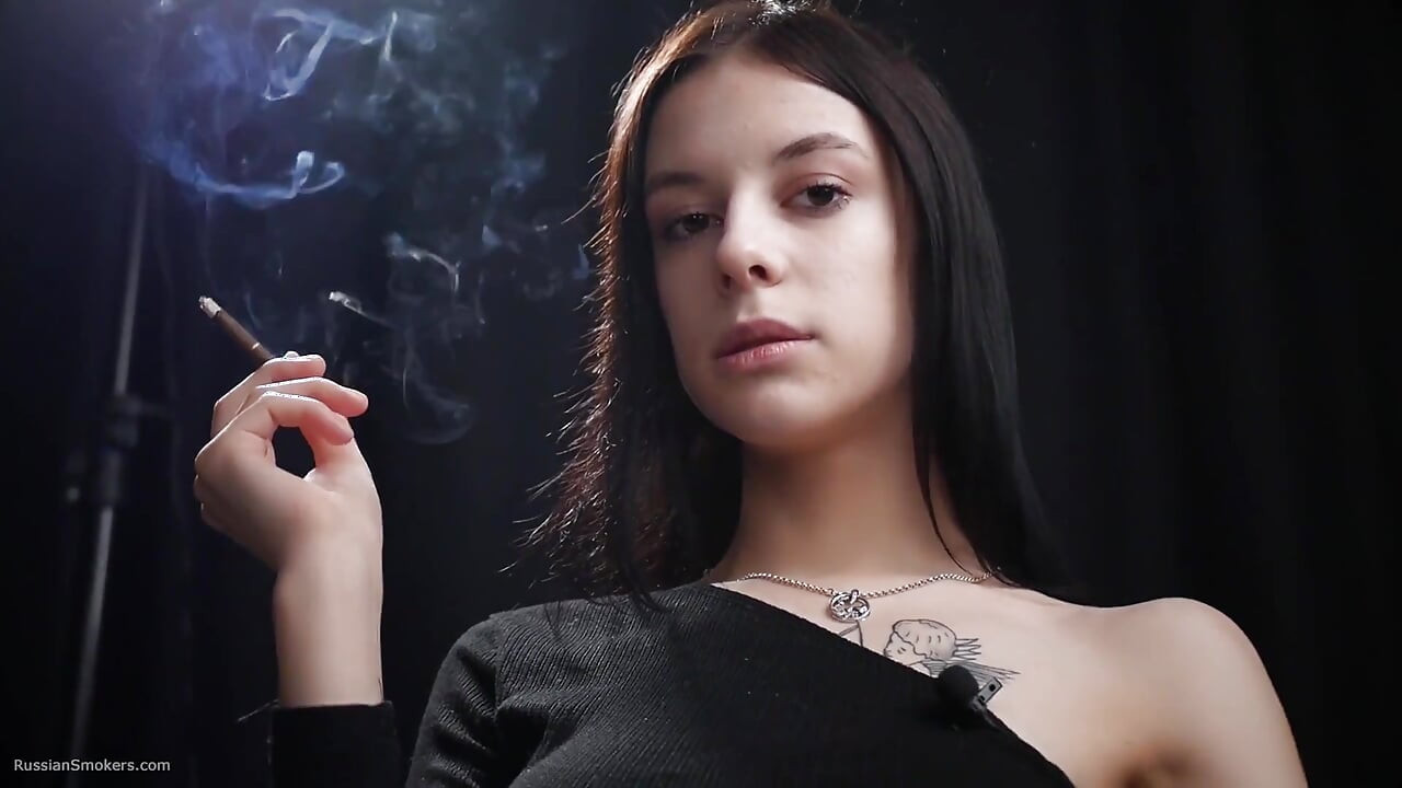 Slim Chick Is Smoking One Red