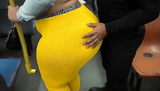 "Masked BBW Teases Huge Ass in Shiny Yellow Leggings on Public Bus"