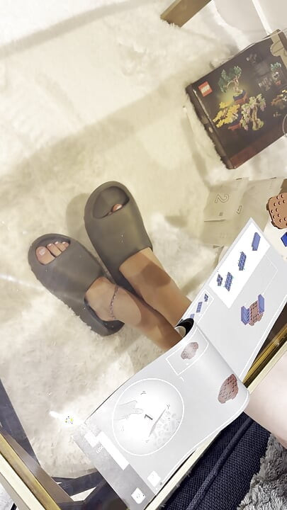 My Feet on Display While I Build Lego