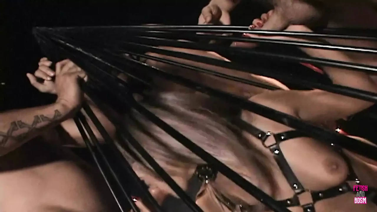 Naughty Blonde Is Caged in by Three Dudes and Sucks All of Their Cocks