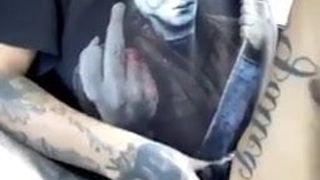 Tattoo Chick doing herself in a car