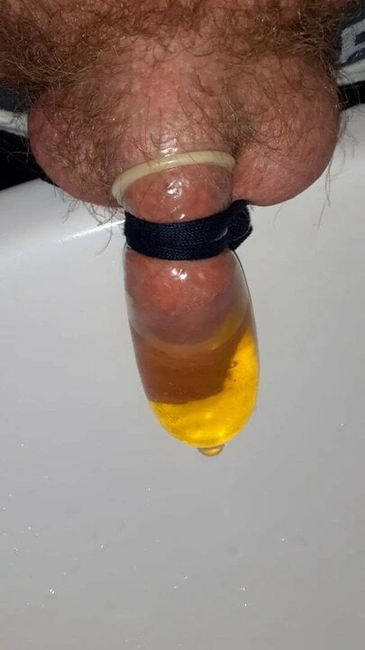 filling a condom with piss