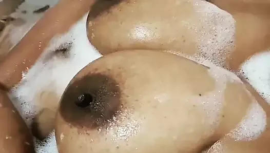 Playing with my sexy big boobs in the bath tub