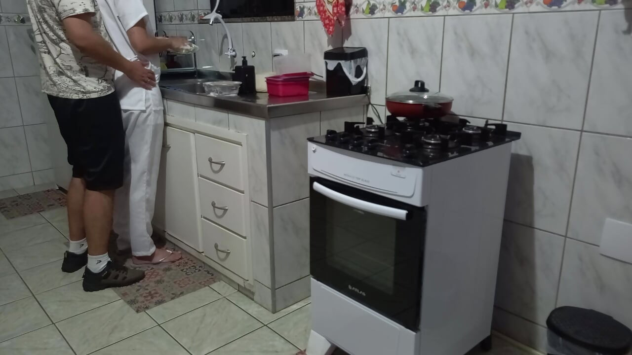 Maid had her ass used while washing dishes.