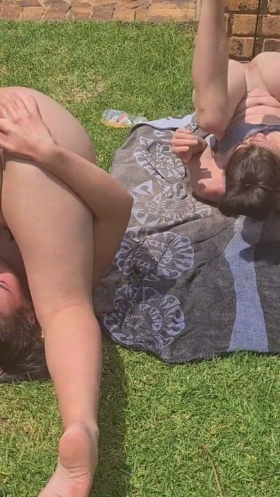 Two slutty friends squirting water out of their asses outside in the garden | Clip 1
