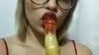 Lusty Whore Lucy sucking a Big Dildo