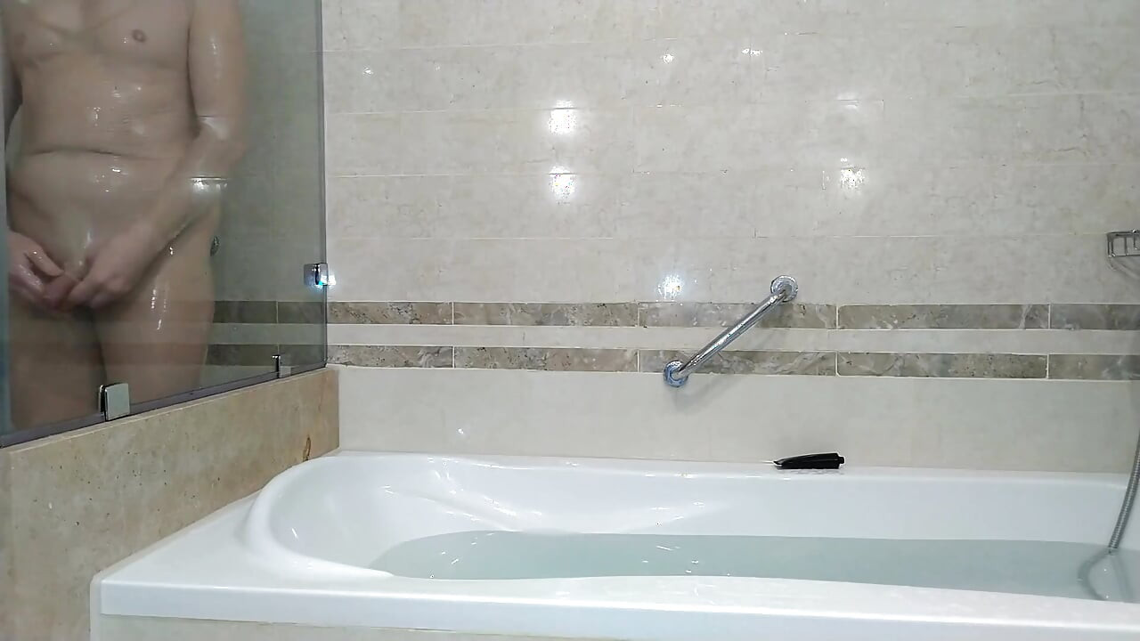 Kinky Mature Guy Masturbates in the Hotel's Room and Bathroom
