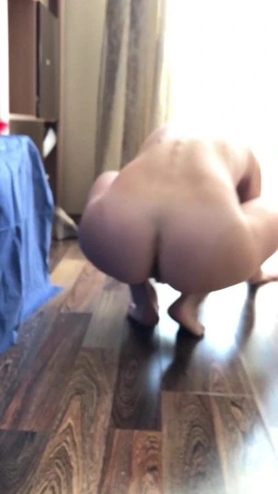 My wife searching something under the sofa