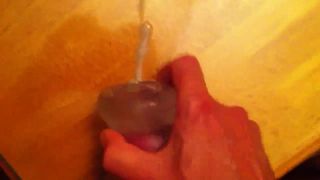 Fucking my sex toy leads to a huge cumshot over the table!