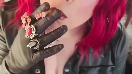 Your Mistress Tina Snua dressed In Leather Chain Smoking 2 Cork Cigarettes