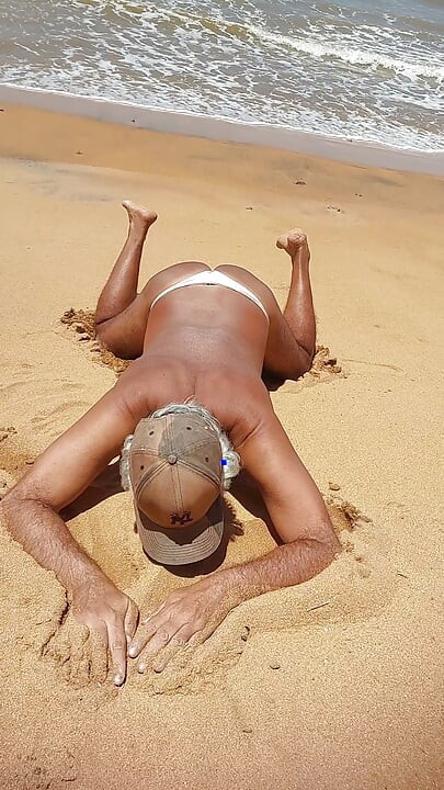 Ladysilva on the beach in sexy panties tanning her hot ass