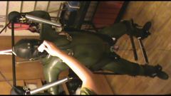 Green and green - swinged rubberslave gets an enjoying