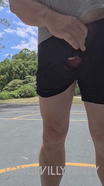 Straight guy hanging out his uncut cock at the public space.