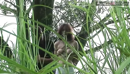 Hot girl gets bound in the bushes for a hard fuck later