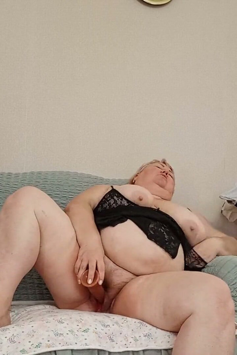 Mother-in-law with a Big Ass and a Dildo in Her Pussy
